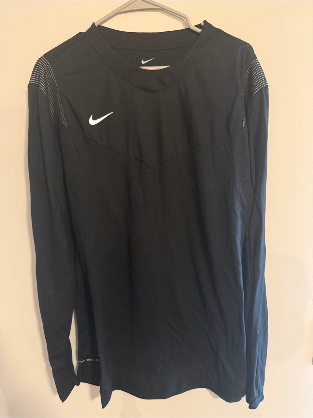 Nike Black Long-Sleeve Athletic Top with White Swoosh